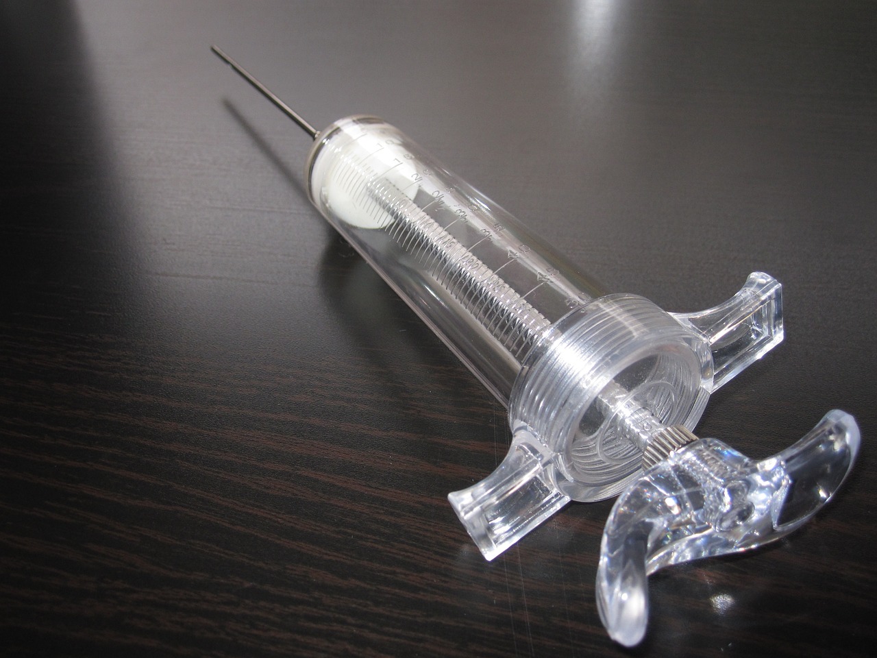 medical device spring in a syringe